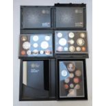 Three Royal Mint United Kingdom proof coin sets with certificates and outer packaging, two 2008