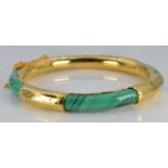 Eastern yellow metal bangle set with malachite panels, 31.3g