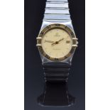Omega Constellation wristwatch ref. 1410.10.00 with date aperture, luminous and gold hands, gold dot