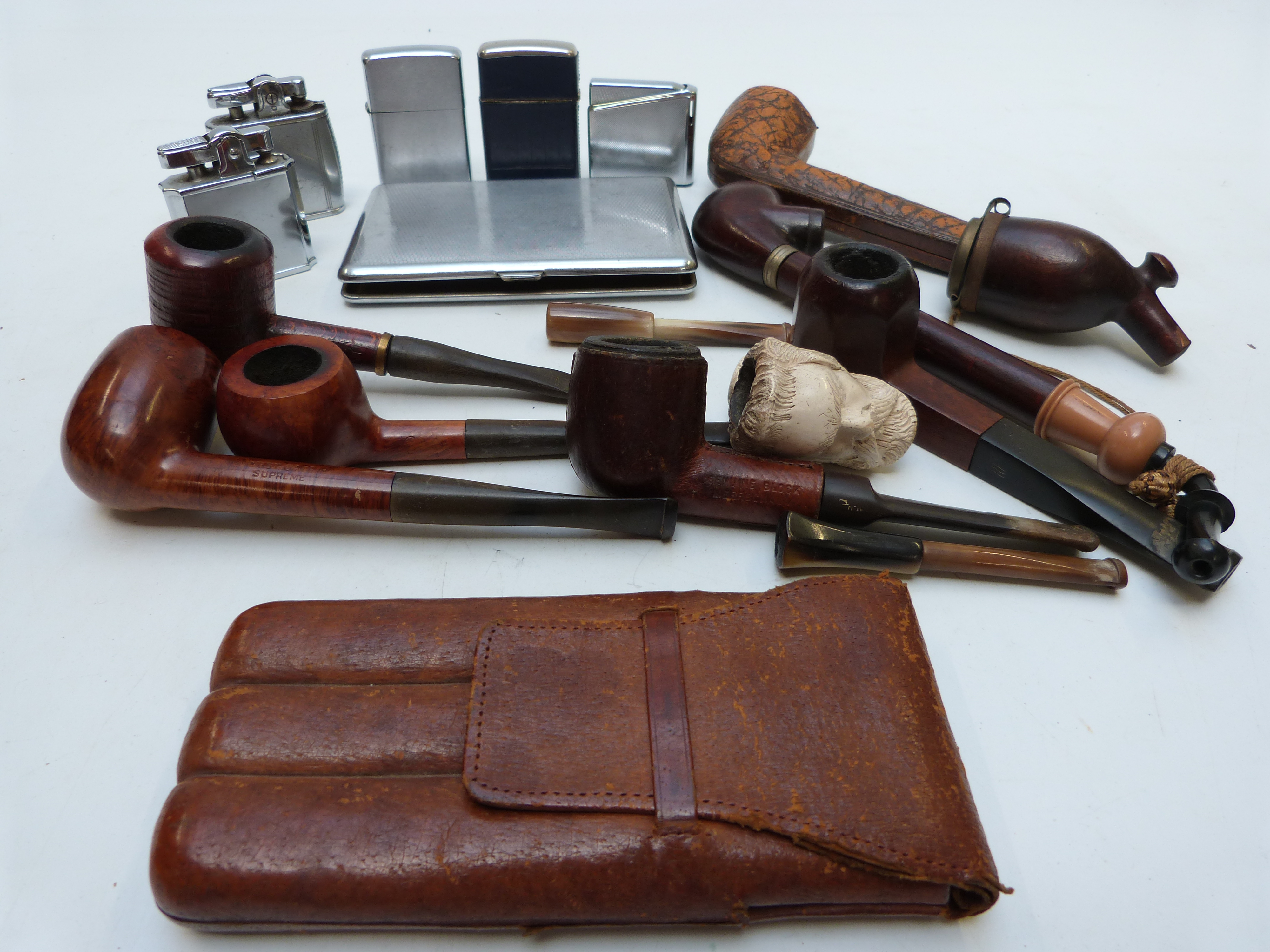 A collection of pipes, lighters including Ronson etc