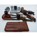 A collection of pipes, lighters including Ronson etc