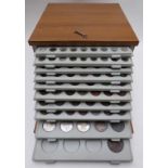 An amateur coin collection of 18thC and 19thC world coinage contained in a 1970s ten-tray lockable