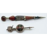 Two Scottish silver kilt pins/ brooches set with various agates in the form of daggers, 23.5g