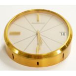 Jaeger-LeCoultre brass cased desk clock, the ivory coloured dial with baton numerals and calendar