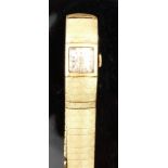 Onsa 18ct gold ladies wristwatch with gold hands and hour markers, silver dial and 17 jewel