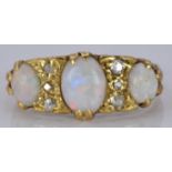 Edwardian ring set with opals and diamonds, 5.0g, size N/O