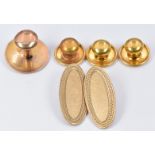 Four 9ct gold studs and a 9ct gold cufflink, 6.6g