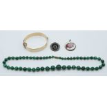 A silver and guilloché enamel pendant, silver brooch, rolled gold bangle and malachite necklace (