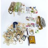 A collection of costume jewellery including Art Deco beaded necklaces, bracelets, Art Deco brooch,