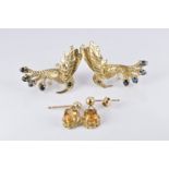 A pair of 9ct gold earrings in the form of hummingbirds set with sapphires and a pair of 9ct gold