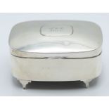 Hallmarked silver jewellery casket with hinged lid, raised on four stepped feet, Birmingham 1920