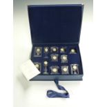 Laura Ricordi cased collection of twelve miniature crystal clocks with certificate