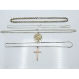 A silver St Christopher, silver cross with gold detail and three silver necklaces, 96g