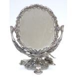 A pewter/ metal figural swing frame, double sided mirror in the WMF Art Nouveau style, height 32cm