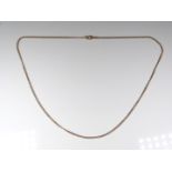A 9ct bi-coloured necklace, 8.4g