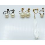 A pair of 9ct gold earrings set with pearls, a similar silver pair and two other 9ct gold earrings