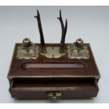 A 19th/20thC oak standish or desk stand with plated mounts, antler pen stand and cut glass inkwells,