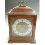 Smiths Electric bracket clock in walnut case with silvered Roman chapter ring and Arabic minutes,
