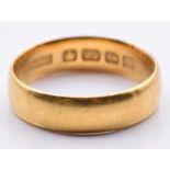 A 22ct gold wedding band/ ring, Birmingham 1915, 3.9g, size J/K