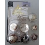 A collection of seven silver, largely proof commemorative coins, most with certificates