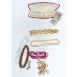 A collection of jewellery including faux pearls, 9ct gold earrings set with garnets and pearls (3.