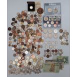 A collection of UK and overseas coinage, includes redeemable examples, banknotes etc, small silver