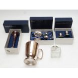 Boxed plated ware including cruet, inkwell, tankard and candlesticks, most by Laurence Watson