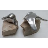 Two Canadian Hoselton polished aluminium sculptures of a stingray/mantaray and a seal raised on