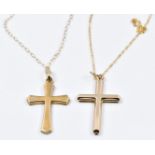Three 9ct gold chains and two 9ct gold cross pendants, 3.1g