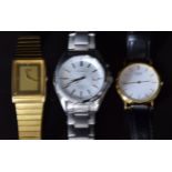 Three Seiko gentleman's wristwatches, one kinetic and two quartz, all in original boxes