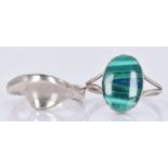 A silver ring set with malachite and another silver ring