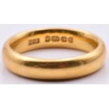 A 22ct gold wedding band/ ring, 7.1g, size K