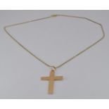 A 15ct gold cross, Birmingham 1913, 3.7g and 9ct gold chain, 1.9g