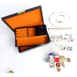 A collection of costume jewellery including four silver rings, vintage ring box, 9ct gold clip,