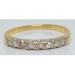 An 18ct gold ring set with diamonds in a platinum setting, 2.4g, size O/P