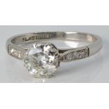 Art Deco platinum ring set with a diamond of approximately 0.6ct with diamond set shoulders, 2.5g,