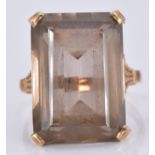 A 9ct gold ring set with a smoky quartz, 7.7g, size O