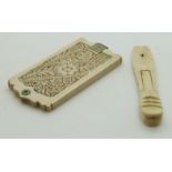 Late 19th/20thC ivory dance card, the covers with pierced decoration, 9.5 x 5cm, together with a