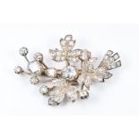 Victorian brooch of foliate design set with old European cut diamonds, the largest approximately 1.