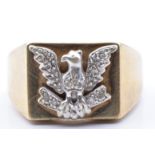 A 9ct gold signet ring depicting an eagle set with diamonds , 6.7g, size T