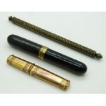 Three 19thC needle cases including a lacquer cigar shaped example, engraved brass etc, largest 17cm