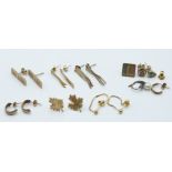 A pair of 14k gold earrings (1.8g) and a collection of 9ct gold earrings including tri-coloured