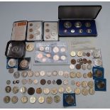 A mixed collection of various coins to include sets, collectable single metal £2, modern crowns,