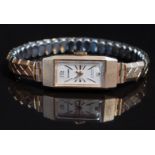 Excalibur 9ct gold ladies wristwatch with gold hands and hour markers, silver dial, rectangular case