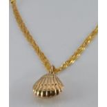 A 9ct gold necklace and shell pendant, 2.4g
