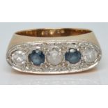 Art Deco 18ct gold ring set with alternating diamonds and sapphires, the three diamonds totalling