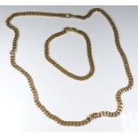 A 14ct gold curb link necklace and bracelet, 83.1g