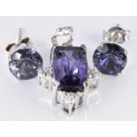 A 9ct white gold pendant set with blueberry quartz and zircon and a pair of 9ct white gold