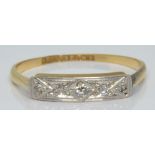 Art Deco 18ct gold ring set with five diamonds in a platinum setting, 1.3g, size K