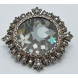 Victorian silver brooch set with a pietra dura plaque surrounded by seed pearls, diameter 2.5cm